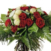 Bouquet of red roses and greenery